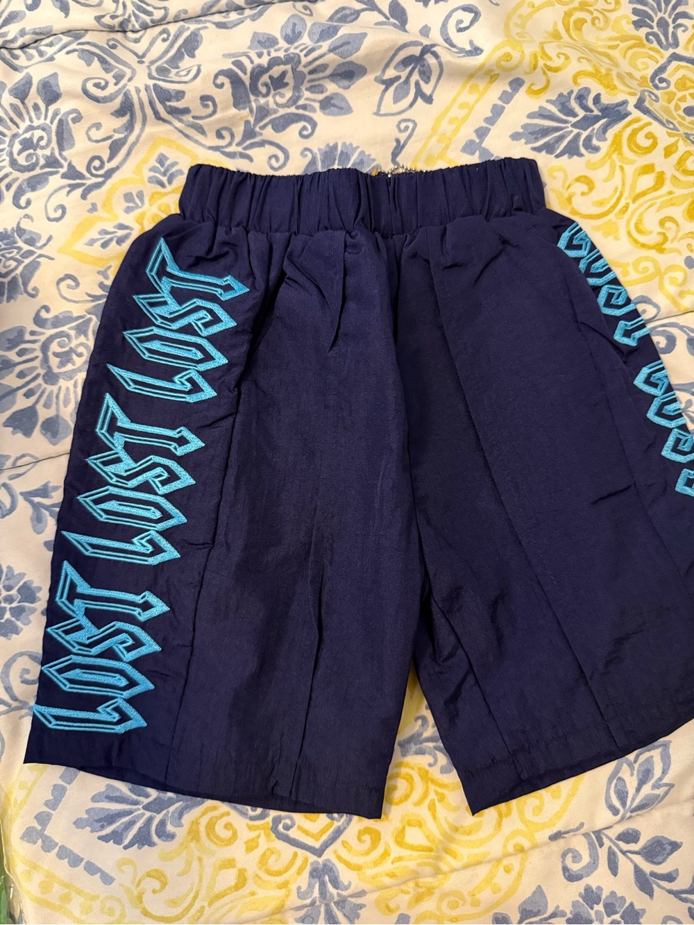 Lost Intricacy kids Size 4 Navy Athletic Shorts with Teal Side Script